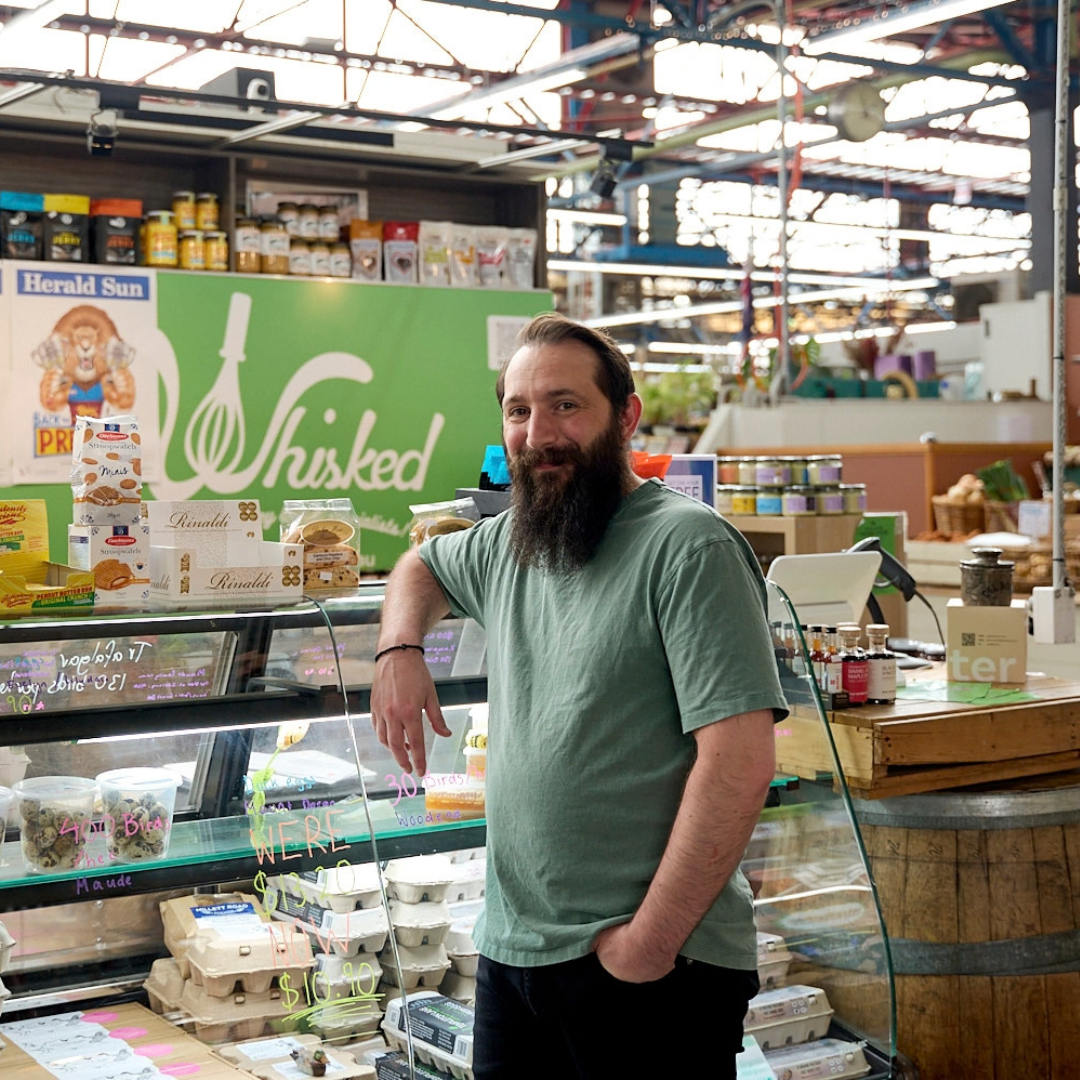 Owner Apostoli standing in front of his shop at Prahran Market